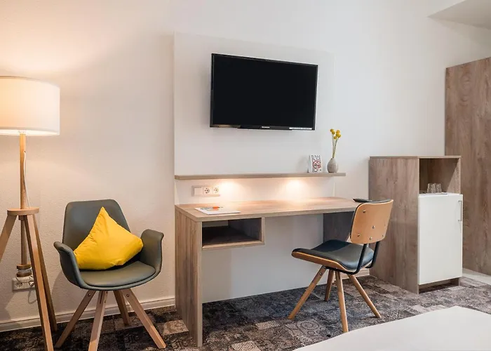 Stadthotel Lohne, Self Check-in&entspannt im Café frühstücken