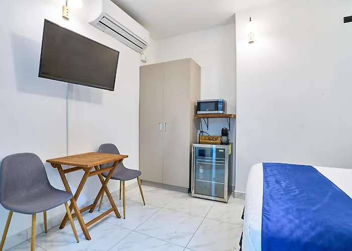 Apartaestudios La Capital