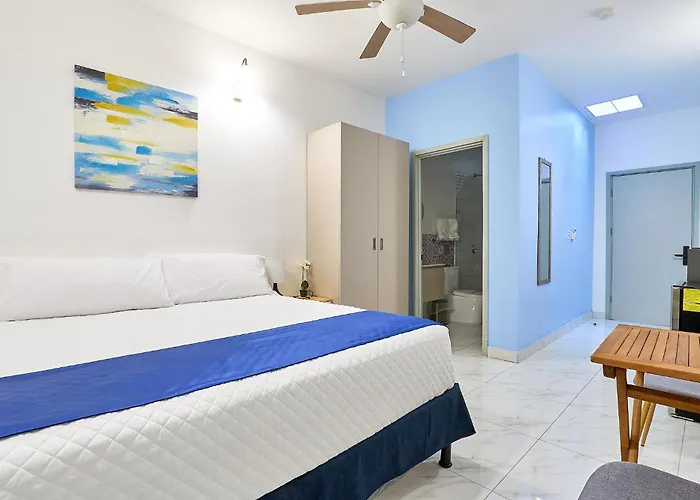 Apartaestudios La Capital