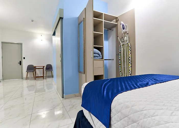 Apartaestudios La Capital