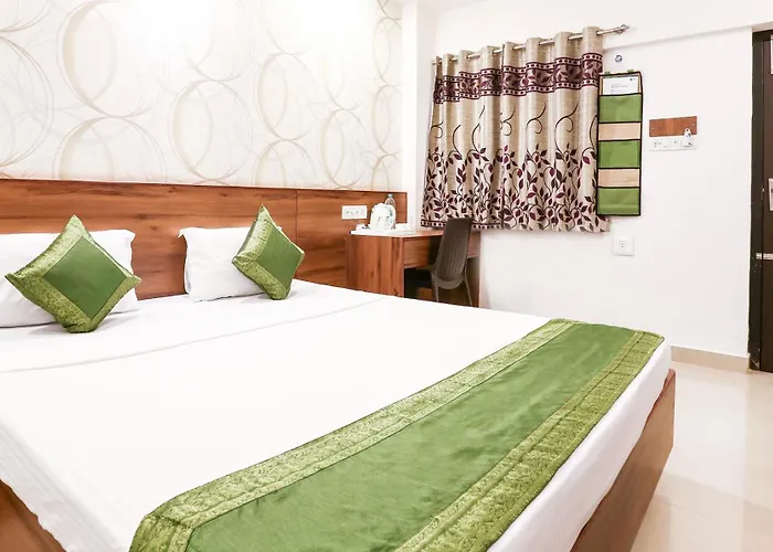 Treebo Comforts Inn, University Road Deralakatte
