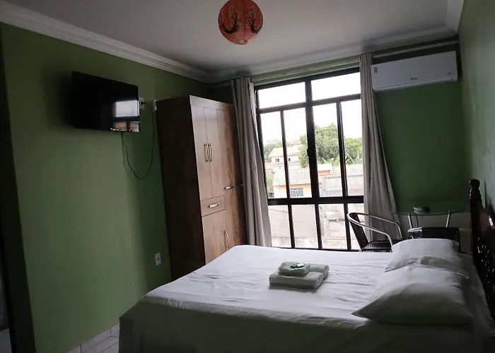 Paradise Hostel e Suítes