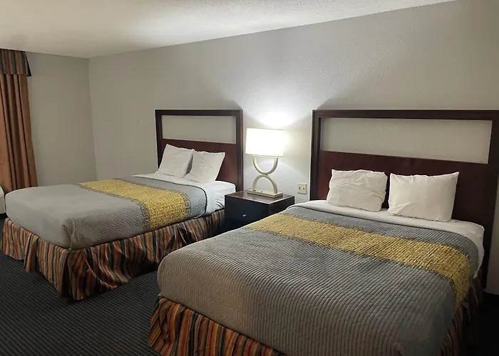 Apm Inn & Suites