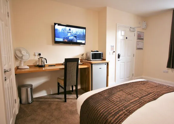 New County Hotel & Serviced Apartments By Roomsbooked